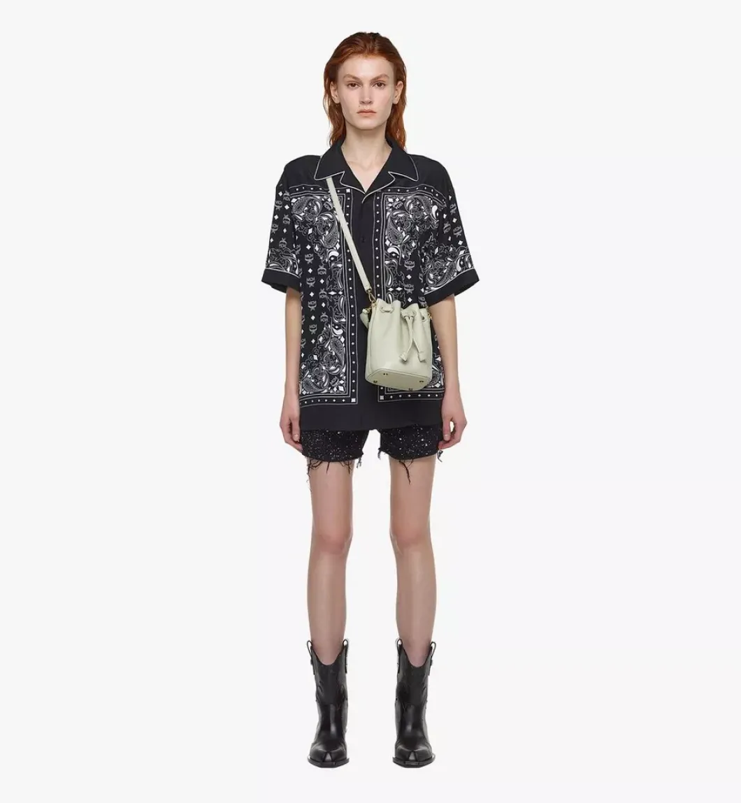 Dessau Drawstring In Embossed Monogram Leather